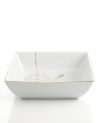 Gold wildflowers flourish on glazed white porcelain, sprouting inside this Charter Club vegetable bowl. A banded edge adds a classic touch to a pattern with modern spirit.
