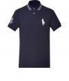 Stylish polo shirt in fine, pure navy pique cotton - A modern riff on a venerable classic from Ralph Lauren - Slim, straight cut - Small, striped collar and short button placket - Oversize polo pony logo at chest and decorative embroidered sleeve - Hem hangs slightly longer in the back - Casually cool, ideal for everyday leisure - Pair with jeans, chinos or shorts