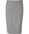 Luxurious pencil skirt in a fine cashmere-wool blend - In an elegant cream with a houndstooth pattern - Particularly nice, high quality material - Typical pencil cut, slim, figure-hugging, in a classic knee length - Wonderfully simple and straightforward, that is why it is so luxurious - No waistband, side  zip - A figure knockout, one that magically makes a dreamy silhouette - An indispensable everyday basic for business women who want to look professional, mature, feminine - Wear with an elegant blouse, tunic (evening), denim jacket (modern), blazer or long cardigan
