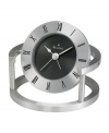 Contemporary flair marks this bedside alarm clock by Bulova. Spun and brushed aluminum frame holds a round pivoting case. Bezel etched with black Roman numerals and black dial features two silver tone hands. Features beep alarm.