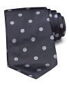This Paul Smith tie adds a touch of color to a sleek suit.