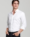 A rich jaquard textured print adorns this luxe Salvatore Ferragamo shirt to create an impeccably masculine impression.