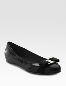 A glossy ballet flat in patent leather made extra sweet with a bow and logo-embossed ornament on vamp. Heel, ½ Leather lining and sole Made in ItalyPlease note: This style runs true to size. A glossy ballet flat in patent leather made extra sweet with a bow and logo-embossed ornament on vamp. Heel, ½ Leather lining and sole Made in ItalyPlease note: This style runs true to size.