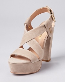 Soft, matte nubuck leather is oh-so-smooth on Pour La Victoire's chic Neala sandals, a platform silhouette with gleaming gold-tone details. Soft, matte nubuck leather is oh-so-smooth on Pour La Victoire's chic Neala sandals, a platform silhouette with gleaming gold-tone details.