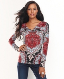 An intricate print spices up a classic cowlneck top from INC. Bold color gives this look a rich, exotic feel. An intricate print spices up a classic cowlneck top from INC. Bold color gives this look a rich, exotic feel.