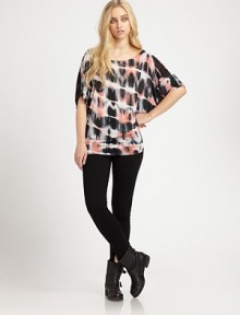 Soft stretch jersey fabric that fits low on the hips is a relaxed, cool look. Wide boatneckDropped shouldersShort dolman sleevesAllover contrasting tie-dyed print90% micro modal/10% silkHand washMade in USAModel shown is 5'9 (176cm) wearing US size XS/S. Soft stretch jersey fabric that fits low on the hips is a relaxed, cool look. Wide boatneckDropped shouldersShort dolman sleevesAllover contrasting tie-dyed print90% micro modal/10% silkHand washMade in USAModel shown is 5'9 (176cm) wearing US size XS/S.