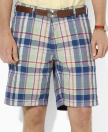 Ralph Lauren's reversible madras short offers the perfect option for ultimate preppy style with a classic navy chino short on one side and a vibrant madras pattern on the other. Ralph Lauren's reversible madras short offers the perfect option for ultimate preppy style with a classic navy chino short on one side and a vibrant madras pattern on the other.