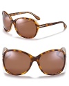 Tom Ford's round oversized sunglasses with metal logo detail at temples embodies chic to a T.