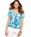 Rock the warm weather with a chic silhouette and bold print in this cute top from Style&co. (Clearance)