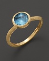 From the Jaipur collection, a brilliantly hued topaz stone in 18 karat yellow gold. From Marco Bicego.