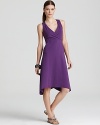 A high/low hem lends intrigue to this breezy Eileen Fisher dress, finished in a vibrant violet hue.