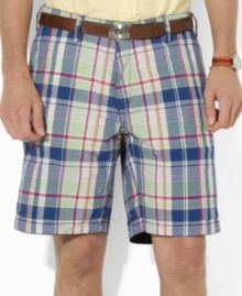 A versatile essential for every warm-weather wardrobe, a soft cotton chino short features one solid side and one madras side for a timeless, preppy look. A versatile essential for every warm-weather wardrobe, a soft cotton chino short features one solid side and one madras side for a timeless, preppy look.