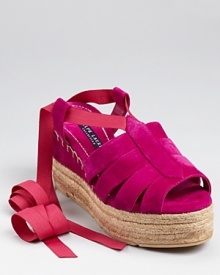 Rich suede and silky grosgrain make a strappy statement on these Ralph Lauren Collection sandals, boasting a jute sole that gives the illusion of a flatform silhouette. Rich suede and silky grosgrain make a strappy statement on these Ralph Lauren Collection sandals, boasting a jute sole that gives the illusion of a flatform silhouette.