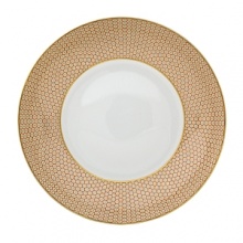 Embellished with an organically complex honeycomb pattern and rendered in gold-tipped earthy hues, the Reynaud Tresor rim soup plate lends boho-chic sophistication to the dining table. Embellished with an organically complex honeycomb pattern and rendered in gold-tipped earthy hues, the Reynaud Tresor rim soup plate lends boho-chic sophistication to the dining table.