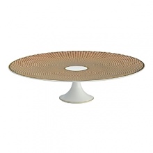 Present desserts, hors d'oeuvres and more on this weighty porcelain serving stand from Raynaud. It can be used individually, or stacked with others in the collection for a dramatic tabletop display.