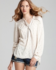 An effortless, silk Rebecca Taylor blouse touts dainty eyelet through the silhouette for a charming update to your new-season collection. An effortless, silk Rebecca Taylor blouse touts dainty eyelet through the silhouette for a charming update to your new-season collection.