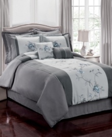 Trailing vines. Gorgeous embroidered florals cascade upon a cool gray landscape in this Regis Vine comforter set for a peaceful ambiance in your space.