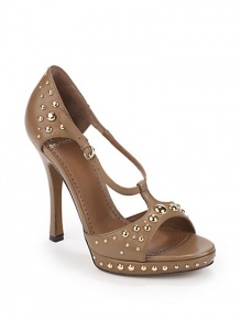 THE LOOKLeather upper with golden dome studsOpen toeAdjustable ankle strapPadded insoleSelf-covered heel, 4½(115mm)Self-covered platform with stud accents, ¾(20mm)Compares to a 3¾ heel(95mm)THE MATERIALLeather upperLeather lining and soleORIGINImported THE LOOKLeather upper with golden dome studsOpen toeAdjustable ankle strapPadded insoleSelf-covered heel, 4½(115mm)Self-covered platform with stud accents, ¾(20mm)Compares to a 3¾ heel(95mm)THE MATERIALLeather upperLeather lining and soleORIGINImported