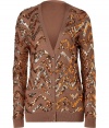Stylish cardigan in fine, rosy brown wool - Glamorous sequin trim - Looks luxurious and trendy - Fashionable, longer cut, feminine fit - With a V-neck, button placket and long, narrow sleeves - Two small pockets - Awesome upgrade piece for simple basics - Wear with the new, wide flared pants, pencil skirts, leather pants