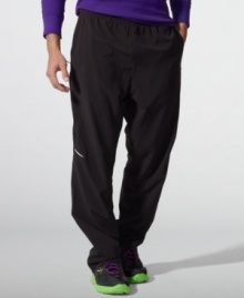 Designed for athletic endeavors and enhanced movement, a sleek athletic pant gets a modern update in stretch polyester jersey with sporty striped details at the sides. Designed for athletic endeavors and enhanced movement, a sleek athletic pant gets a modern update in stretch polyester jersey with sporty striped details at the sides.