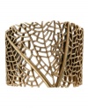 Fashion as art. Lucky Brand's chic cuff bracelet features intricate, open work patterns. Crafted in gold tone mixed metal. Approximate diameter: 2-1/3 inches.