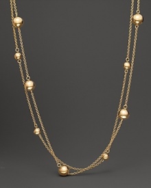 From the Pallini collection, a station bead necklace in yellow gold. With signature ruby accent. Designed by Roberto Coin. From the Pallini collection, a station bead necklace in yellow gold. With signature ruby accent. Designed by Roberto Coin.