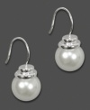 A little bit of elegance by AK Anne Klein. These earrings feature glass pearls set in silvertone mixed metal. Approximate drop: 1/2 inch.