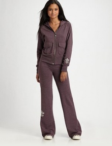 Traditional hooded style updated by large front patch pockets and rhinestones that form a fleur-de-lis. Attached hood Zip front closure Front patch pockets Ribbed hem and cuffs 65% polyester/35% cotton Machine wash Imported Traditional hooded style updated by large front patch pockets and rhinestones that form a fleur-de-lis. Attached hood Zip front closure Front patch pockets Ribbed hem and cuffs 65% polyester/35% cotton Machine wash Imported