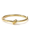 A sailor's knot bangle from kate spade new york conjures summers spent in Cape Cod cottages and East End estates.