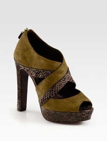 An exposed zipper finishes this platform sandal of watersnake and suede with patent leather trim. Watersnake-covered heel, 5 (125mm)Covered platform, 1 (25mm)Compares to a 4 heel (100mm)Suede and watersnake upper with patent leather trimBack zipperPeep toeLeather lining and solePadded insoleImported An exposed zipper finishes this platform sandal of watersnake and suede with patent leather trim. Watersnake-covered heel, 5 (125mm)Covered platform, 1 (25mm)Compares to a 4 heel (100mm)Suede and watersnake upper with patent leather trimBack zipperPeep toeLeather lining and solePadded insoleImported