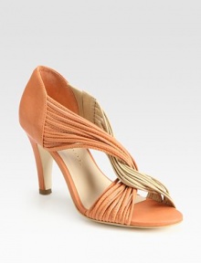 Elegantly twisted leather straps cross the front of the foot, concluding with a substantial heel. Self-covered heel, 3½ (90mm)Leather upperLeather liningBuffed leather solePadded insoleImportedOUR FIT MODEL RECOMMENDS ordering true size. Elegantly twisted leather straps cross the front of the foot, concluding with a substantial heel. Self-covered heel, 3½ (90mm)Leather upperLeather liningBuffed leather solePadded insoleImportedOUR FIT MODEL RECOMMENDS ordering true size.