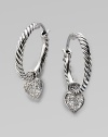 From the Cable Collectibles Collection. A pavé diamond heart elegantly hangs from a delicate braided sterling silver hoop.Diamonds, 0.13 tcw Sterling silver Imported