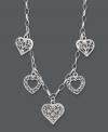 This Giani Bernini style is certain to capture your heart. For the free-spirited fashionista, five filigree hearts create an enchanting look you'll cherish forever. Crafted in sterling silver. Approximate length: 16 inches.