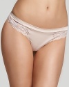 A soft and sleek thong with sheer floral lace detail at hips.