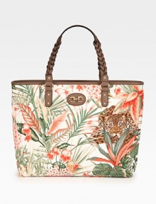 Safari-inspired in rich vary-print canvas, finished with leather trim and braided top handles.Double top handles, 6¼ dropTop zip closureProtective metal feetOne inside zip pocketTwo inside open pocketsCotton lining12½W X 10¼H X 3¾DPattern may varyMade in Italy Safari-inspired in rich vary-print canvas, finished with leather trim and braided top handles.Double top handles, 6¼ dropTop zip closureProtective metal feetOne inside zip pocketTwo inside open pocketsCotton lining12½W X 10¼H X 3¾DPattern may varyMade in Italy