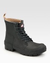 The same signature Hunter fit and comfort, designed in military-inspired vulcanized rubber with logo detail.Rubber upperRear pull tabPadded insoleRubber soleImported