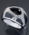 Get people talking. This unique GUESS ring feature crystal accents intertwined with smooth black enamel and set in silvertone mixed metal. Size 8.