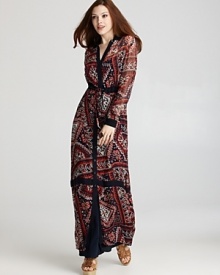 Sam & Lavi channels bohemian luxe with this floor-sweeping maxi dress, emboldened by a global-inspired print. Sam & Lavi channels bohemian luxe with this floor-sweeping maxi dress, emboldened by a global-inspired print.