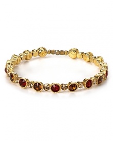 Stacks of bracelets are a chic staple, and this rhinestone and topaz-encrusted style from Seasonal Whispers is a rich way to work the trend. Stacks of bracelets are a chic staple, and this rhinestone and topaz-encrusted style from Seasonal Whispers is a rich way to work the trend.