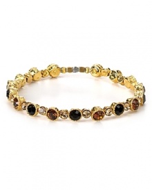 Stacks of bracelets are a chic staple, and this rhinestone and topaz-encrusted style from Seasonal Whispers is a rich way to work the trend. Stacks of bracelets are a chic staple, and this rhinestone and topaz-encrusted style from Seasonal Whispers is a rich way to work the trend.