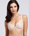 A soft cup underwire bra with sheer mesh wings and convertible straps for a versatile silhouette.
