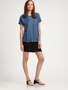 Chic chambray top has ruched shoulders, rolled cuffs and a single front patch pocket. RoundneckRuched shouldersShort sleeves with rolled cuffsSingle front patch pocketLyocellMachine washImportedModel shown is 5'9½ (176cm) wearing US size Small. Chic chambray top has ruched shoulders, rolled cuffs and a single front patch pocket. RoundneckRuched shouldersShort sleeves with rolled cuffsSingle front patch pocketLyocellMachine washImportedModel shown is 5'9½ (176cm) wearing US size Small.