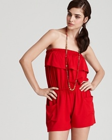 A ruffled neckline puts a flirtatious spin on Shoshanna's strapless romper. In a romantic hue, this low-fuss piece hints at your inner beach bombshell. A ruffled neckline puts a flirtatious spin on Shoshanna's strapless romper. In a romantic hue, this low-fuss piece hints at your inner beach bombshell.