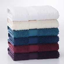Exquisitely soft and in a wondrous array of colors, this towel is designed with superior quality. Embellished with decorative ribbed band. Exquisitely soft and in a wondrous array of colors, this towel is designed with superior quality. Embellished with decorative ribbed band.