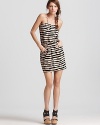 In a vaguely retro wave print, this geometric Aqua dress feels upbeat in a strapless silhouette.