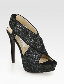 This glittery silhouette with soft suede trim and a piercing heel is the best companion for a night out. Suede-covered heel, 5 (125mm)Glitter-covered platform, 1¼ (30mm)Compares to a 3¾ heel (95mm)Glitter-coated fabric upper with suede trimLeather liningLeather and rubber solePadded insoleImported This glittery silhouette with soft suede trim and a piercing heel is the best companion for a night out. Suede-covered heel, 5 (125mm)Glitter-covered platform, 1¼ (30mm)Compares to a 3¾ heel (95mm)Glitter-coated fabric upper with suede trimLeather liningLeather and rubber solePadded insoleImported