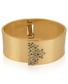 A touch of glass goes far in this bangle from Kenneth Cole New York. Crafted from gold-tone mixed metal, the bracelet is adorned with pave glass crystal accents for a fashion infusion. Approximate diameter: 2-3/8 inches. A touch of glass goes far in this bangle from Kenneth Cole New York. Crafted from gold-tone mixed metal, the bracelet is adorned with pave glass crystal accents for a fashion infusion. Approximate diameter: 2-3/8 inches.