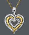 Lovely luster. This adorable heart pendant features rows of round-cut diamonds (1/5 ct. t.w.) in a polished sterling silver and 14k gold setting. Approximate length: 18 inches. Approximate drop: 1/2 inch.