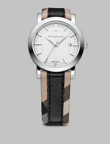 A solid color patent leather band with piping is a sleek update to this classic look. Analog movement Water resistant up to 50m Round case, 38mm, 1½ Stainless steel White dial Date display Second hand Markers Patent leather strap width with check piping, 20mm, .79 Made in Switzerland A solid color patent leather band with piping is a sleek update to this classic look. Analog movement Water resistant up to 50m Round case, 38mm, 1½ Stainless steel White dial Date display Second hand Markers Patent leather strap width with check piping, 20mm, .79 Made in Switzerland