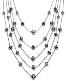 Lighten up! The airy, lightweight look of Carolee's five-row illusion necklace is anchored by pretty purple glass rondelle beads. Made in mixed metal, it's a chic and unique addition to your wardrobe. Approximate length: 17 inches. Lighten up! The airy, lightweight look of Carolee's five-row illusion necklace is anchored by pretty purple glass rondelle beads. Made in mixed metal, it's a chic and unique addition to your wardrobe. Approximate length: 17 inches.
